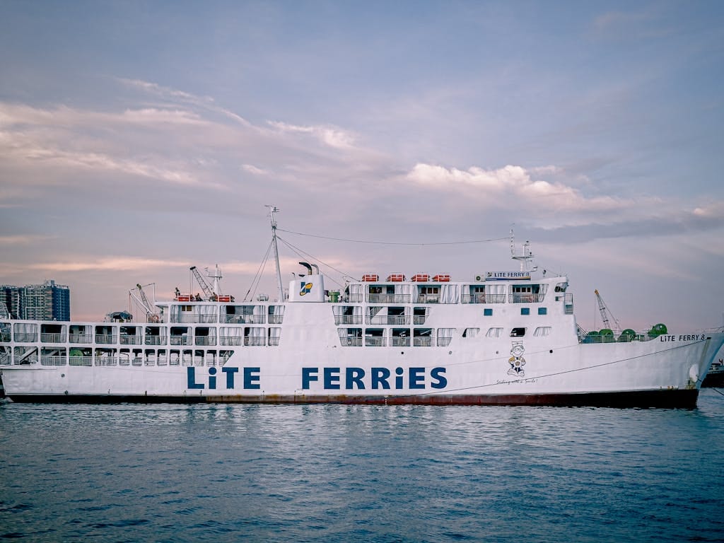 Large Lite Ferry ship docked in Cebu City, Philippines at dusk.